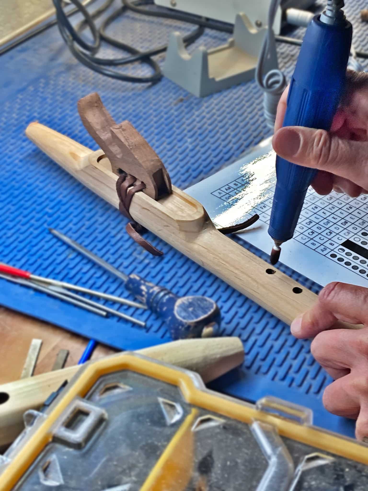 Drilling a hole in wood at Rocky Mountain Folk School in Grand Lake, Colorado