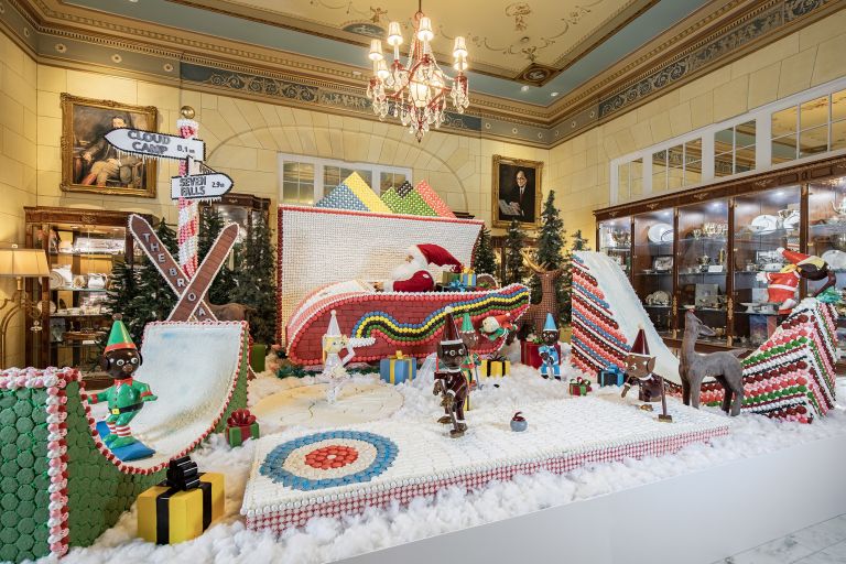 Santa Claus on a bobsled made out of candy in Colorado Springs