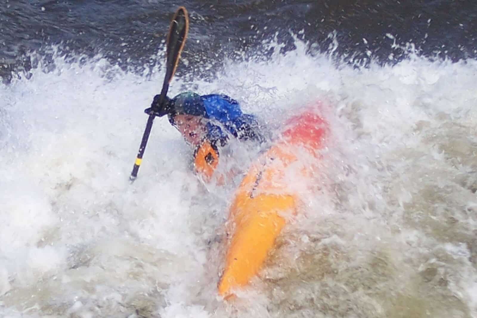 Kayaker on the Eagle River at the Avon Whitewater Park