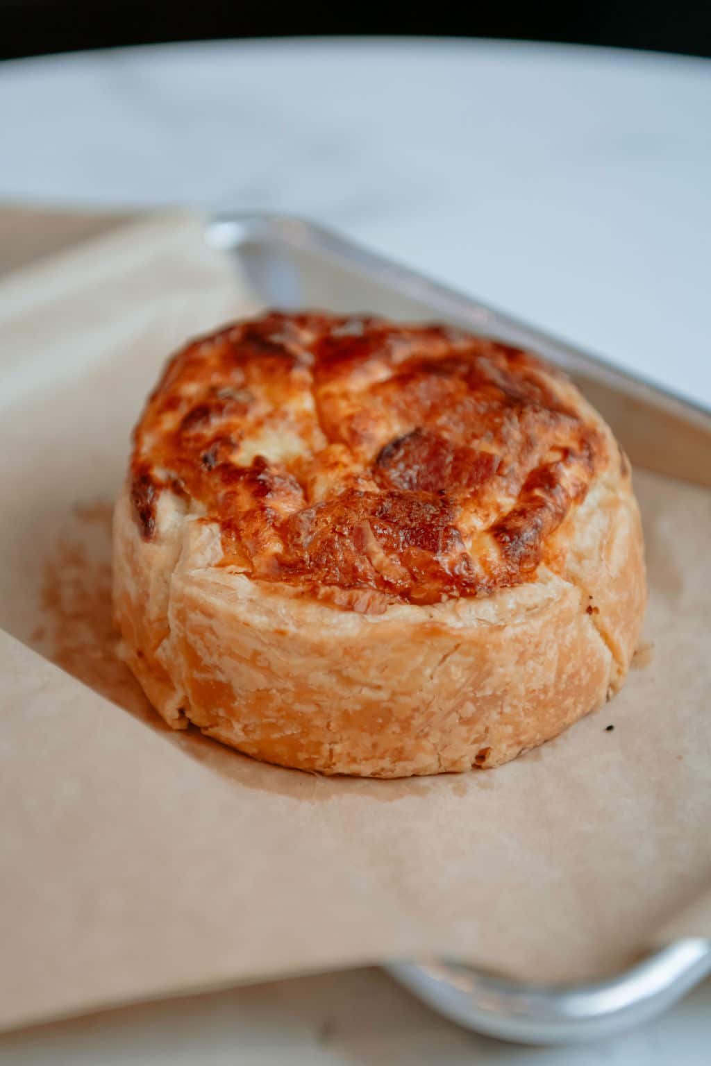 Close up of a mini quiche at Olive & Finch in Denver, Colorado
