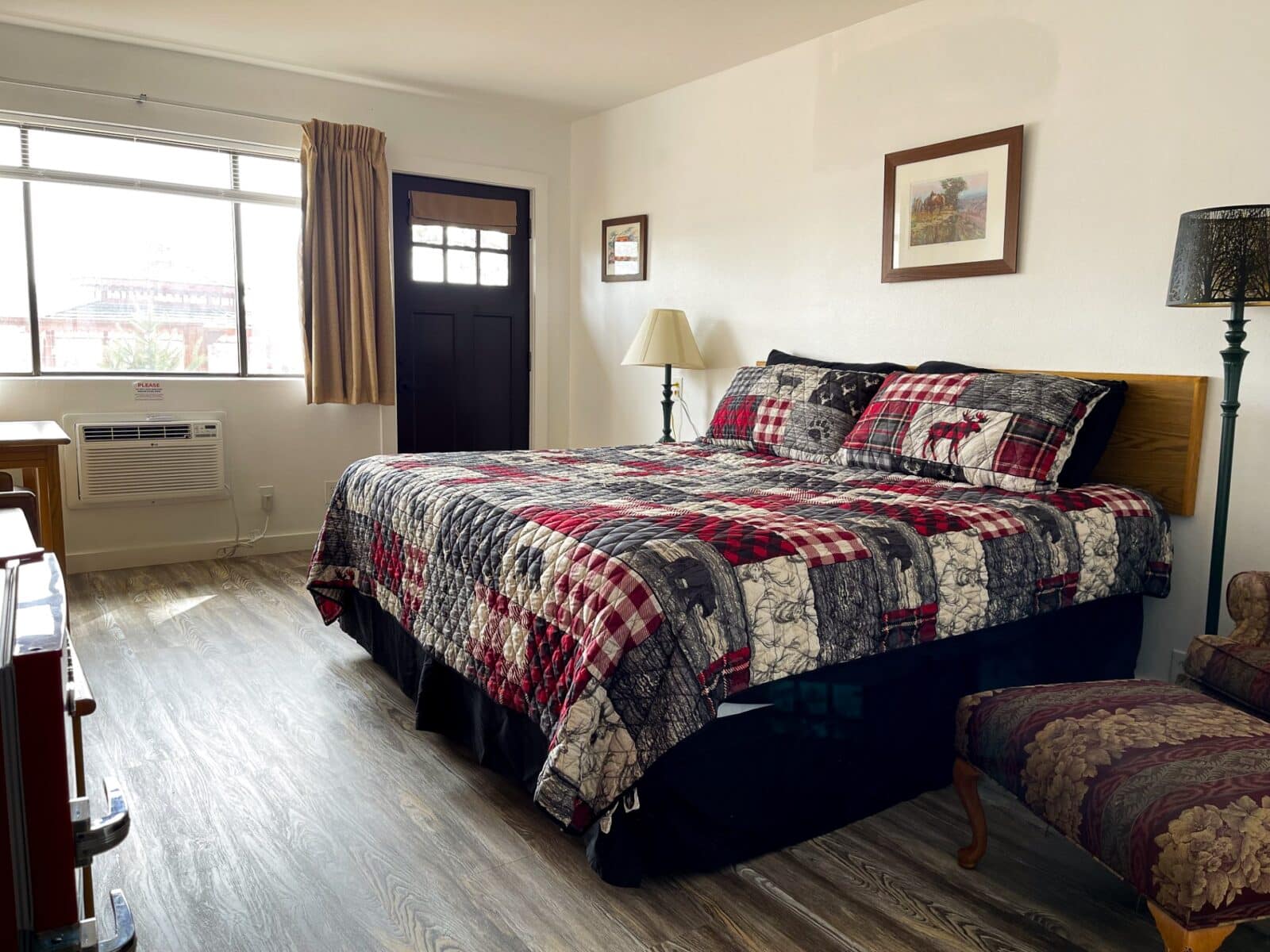 studio hotel room with king bed at Riverwood Resort on the Gunnison