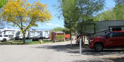 Trailers parked at the RV Park at Riverwood Resort on the Gunnison Park in Delta, CO