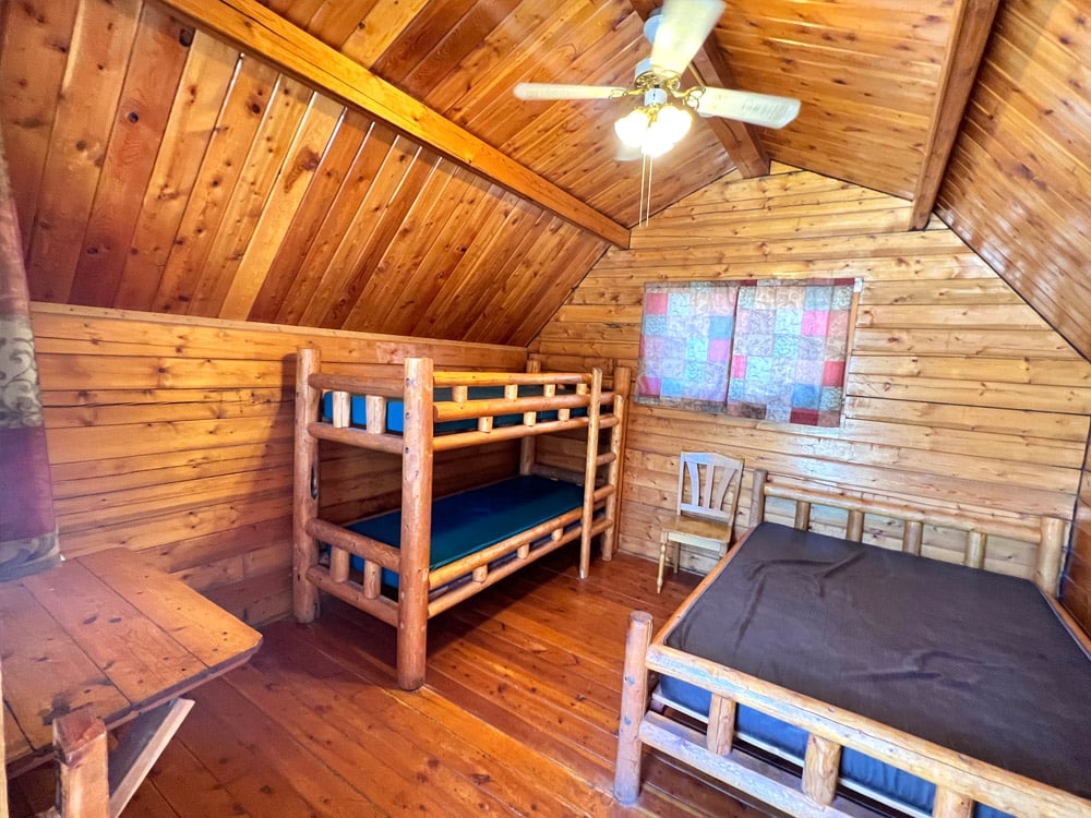 interior of basic cabin with bunk beds at A-Lodge-Salida