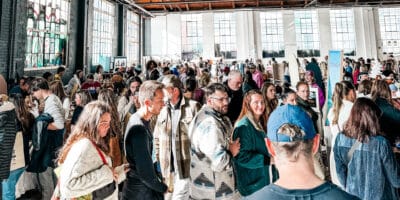large crowd of people inside at the Vibe Artisan Market in Denver