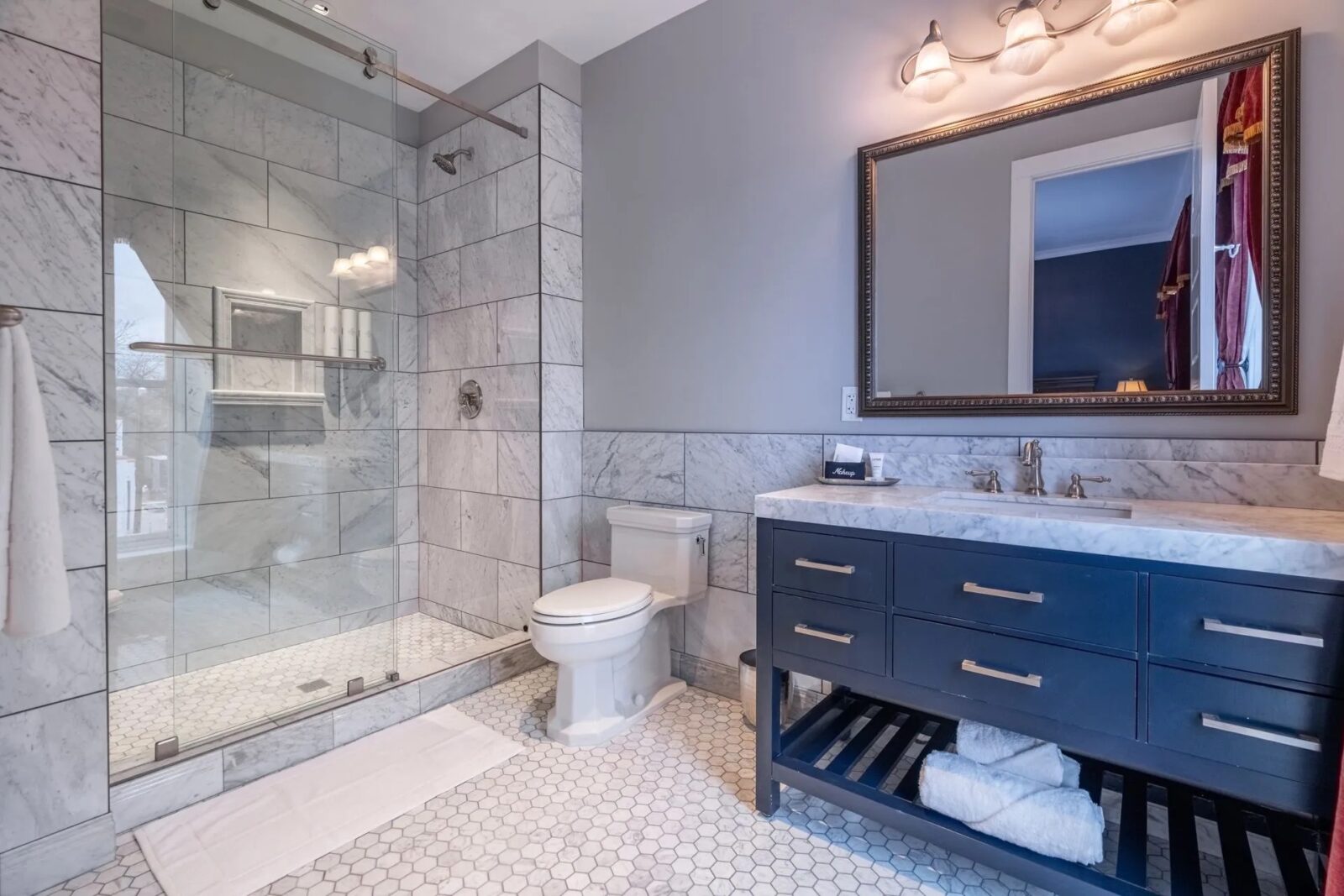 upscale bathroom with shower for guest room at Hotel St. Cloud in Canon City