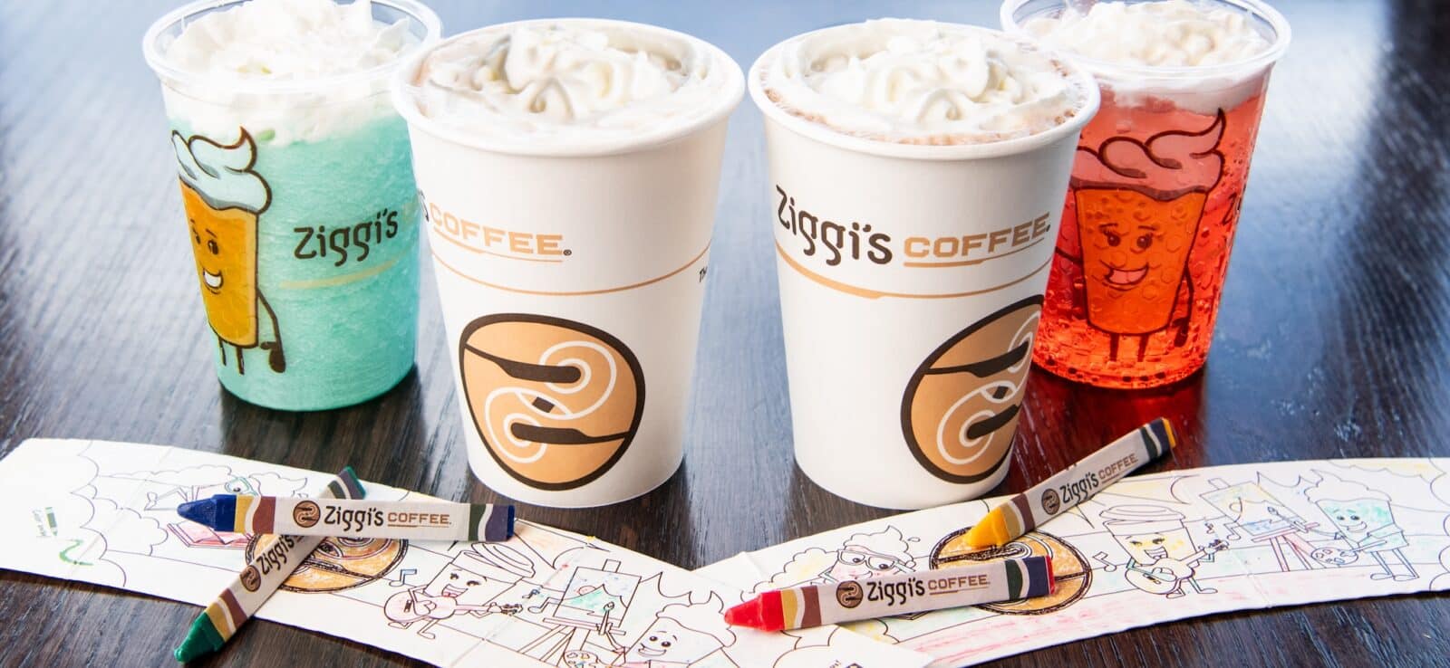 cups of kids drinks and crayons at Ziggi's Coffee