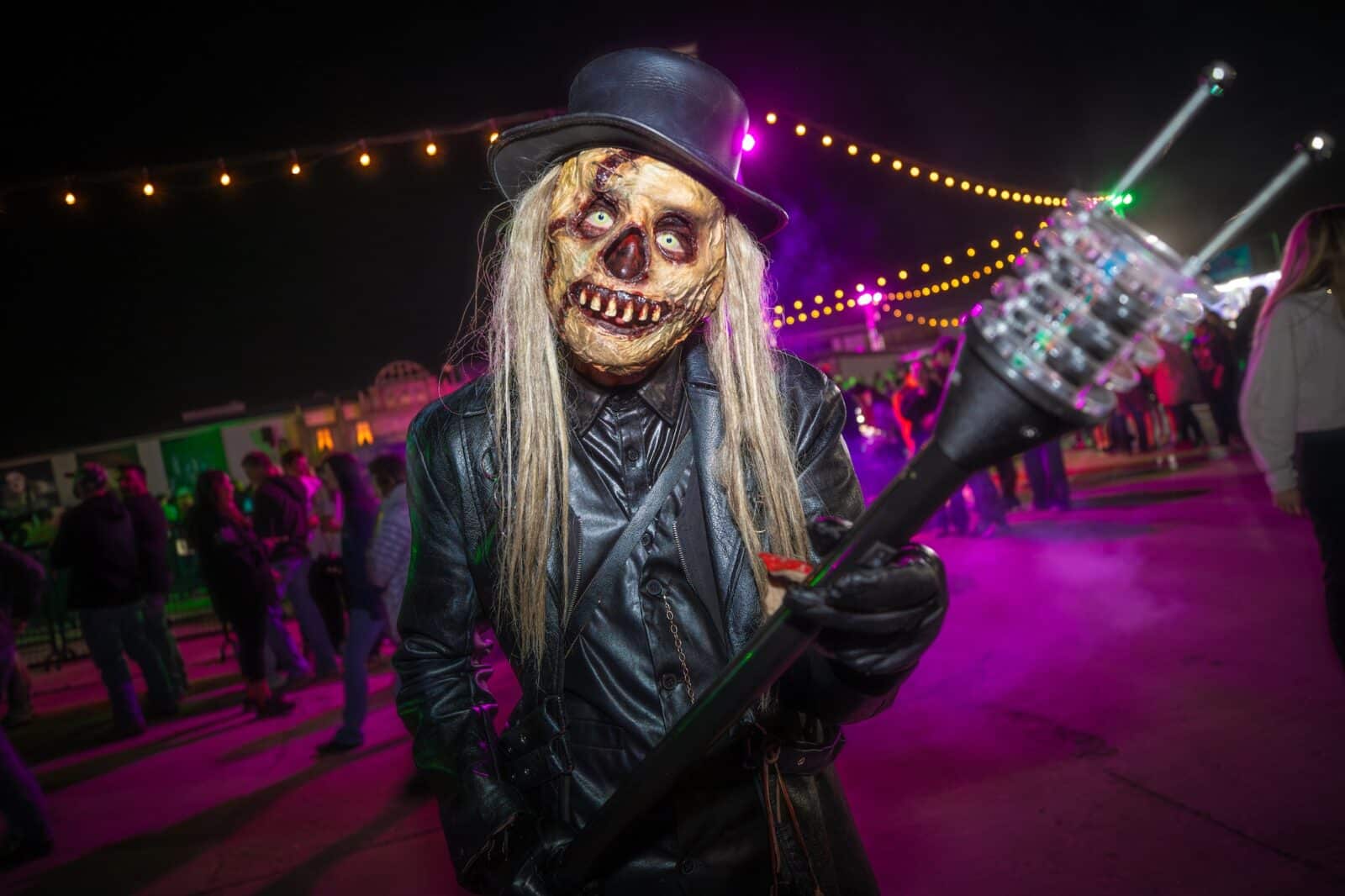 scary ghoul with guitar at 13th Floor Haunted House in Denver