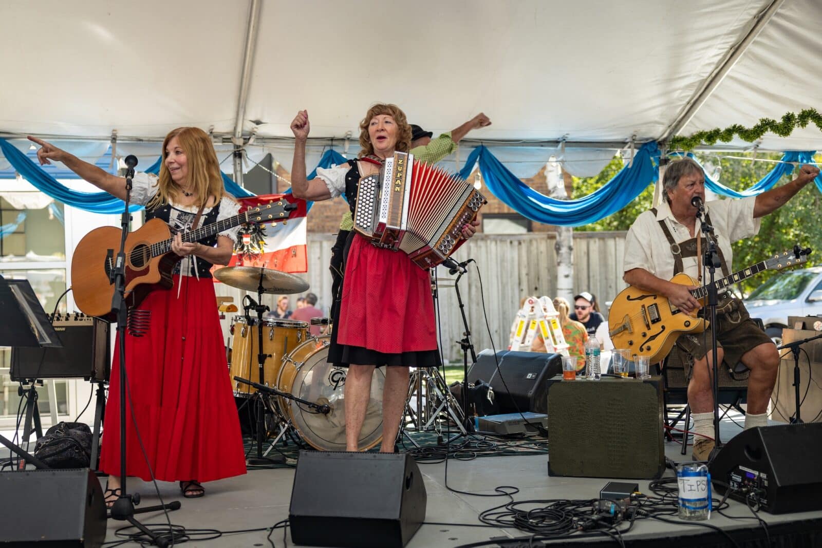 band dressed in traditional German outfits performing at Highlands Oktoberfest