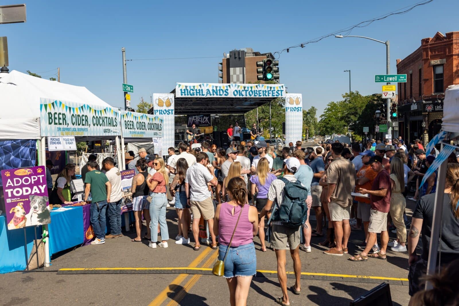 crowd gathers in front of stage at Highlands Oktoberfest