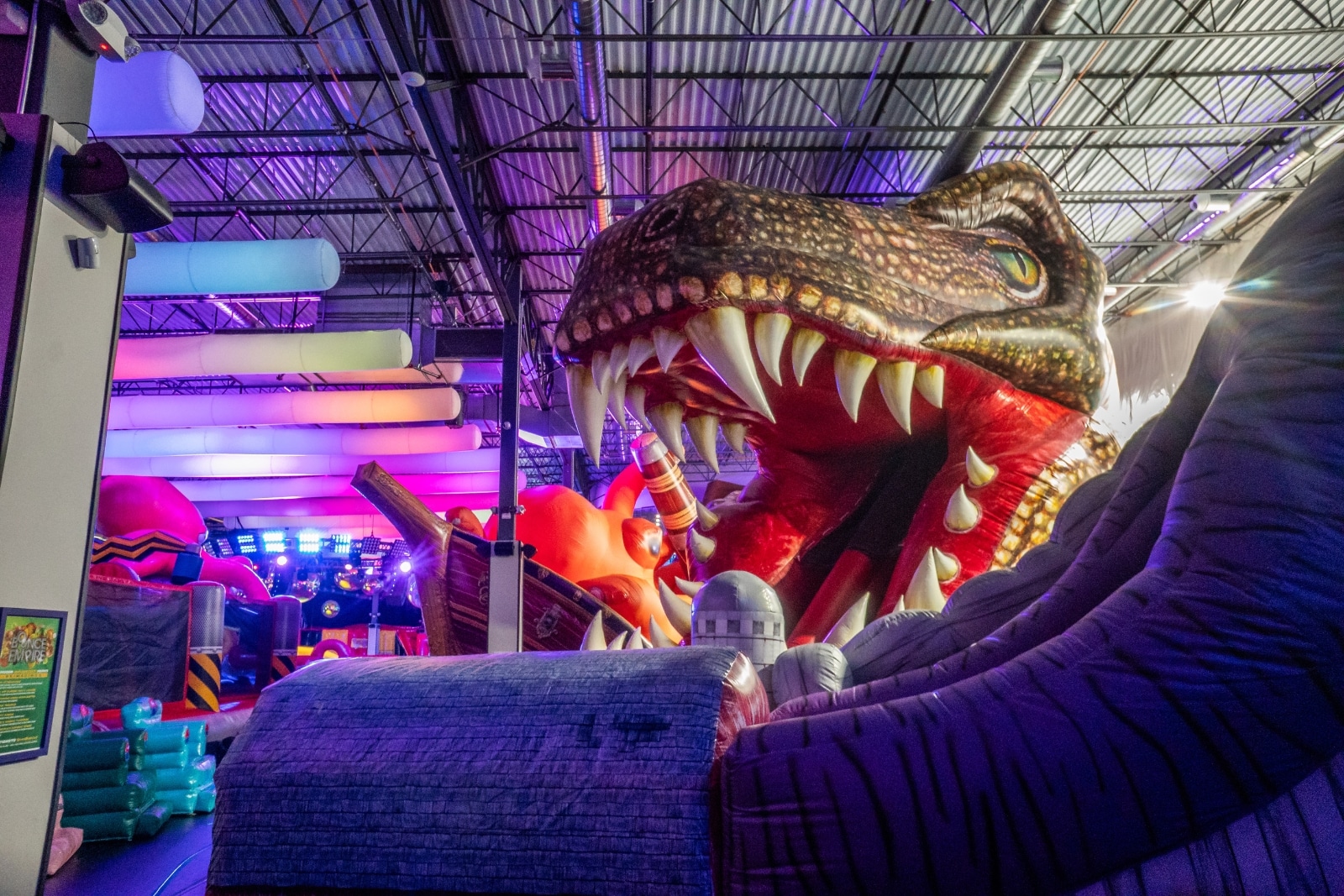 dinosaur head inflatable at Bounce Empire in Lafayette