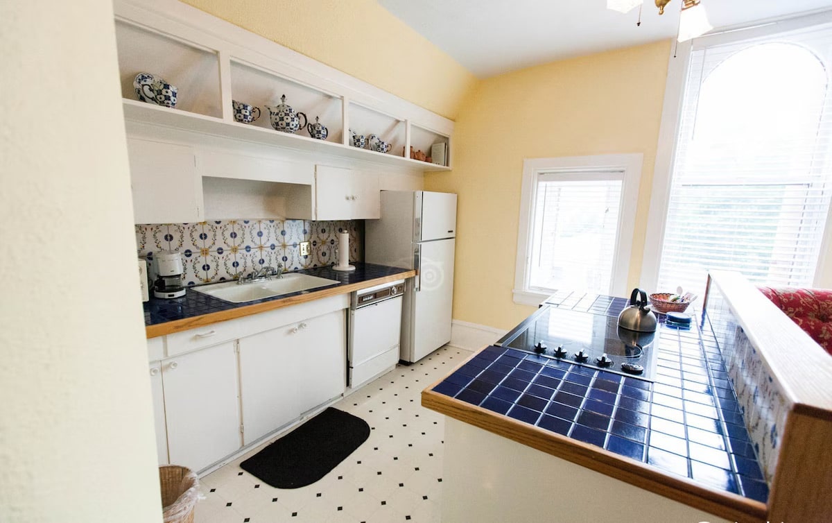 Suite with a private kitchen with blue countertops at Capitol Hill Bed and Breakfast