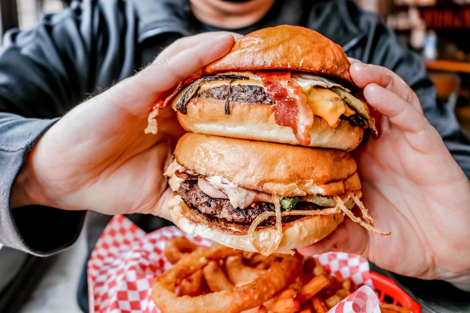 made holds two burgers stacked on each other from Cherry Cricket