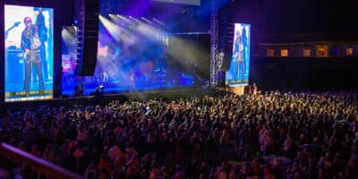 overlooking the dark crowd with Leon Bridges on-stage at the Jazz Aspen Snowmass Labor Day Experience