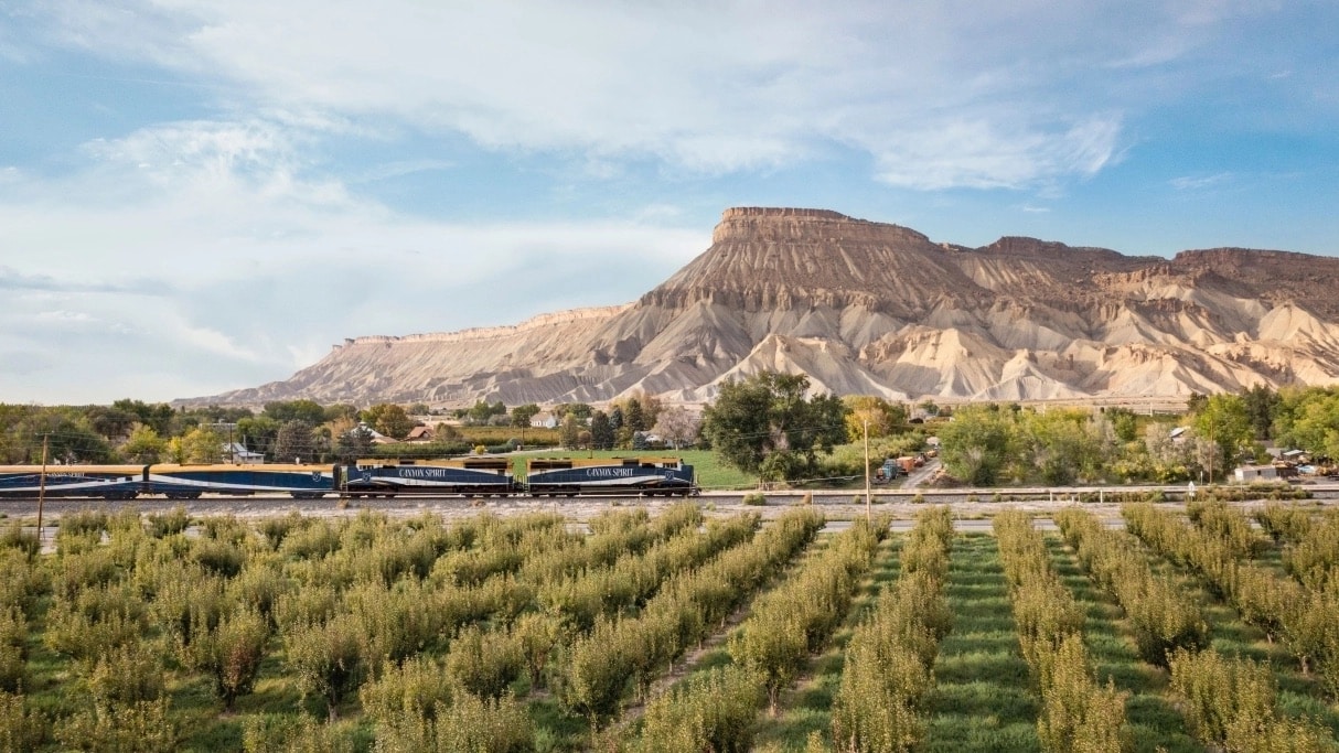 Mount Garfield in Western Colorado rises over the Canyon Spirit train