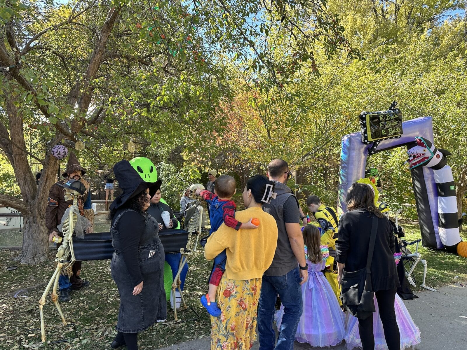 families trick or treating at Pueblo Zoo Boo