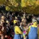 crowd of people in costumes at the Pueblo ZooBoo event with fall colors