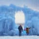 ice sculptures form large arches at Ice Castles in Colorado