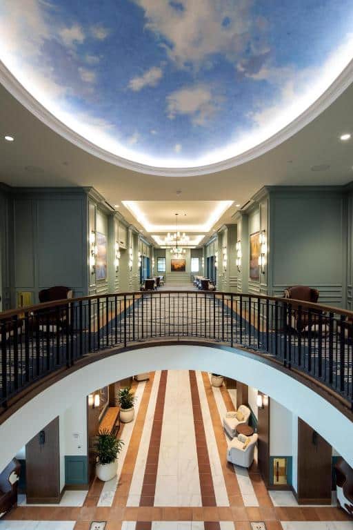 hotel lobby circular ceiling with picture of earth in The Benson Hotel in Aurora, Colorado