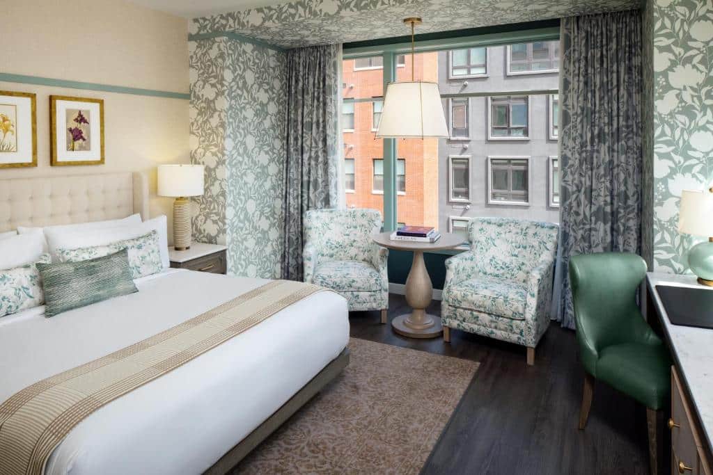 king room with view of buildings at The Benson Hotel in Aurora, Colorado