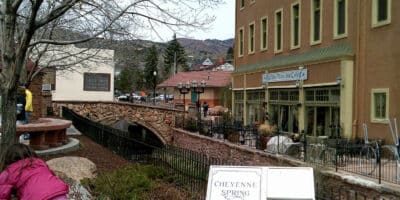 looking at people in downtown Manitou Springs and Canon Avenue bridge over Fountain Creek