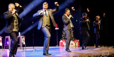 Face Vocal Band performing on stage in Fort Collins, Colorado