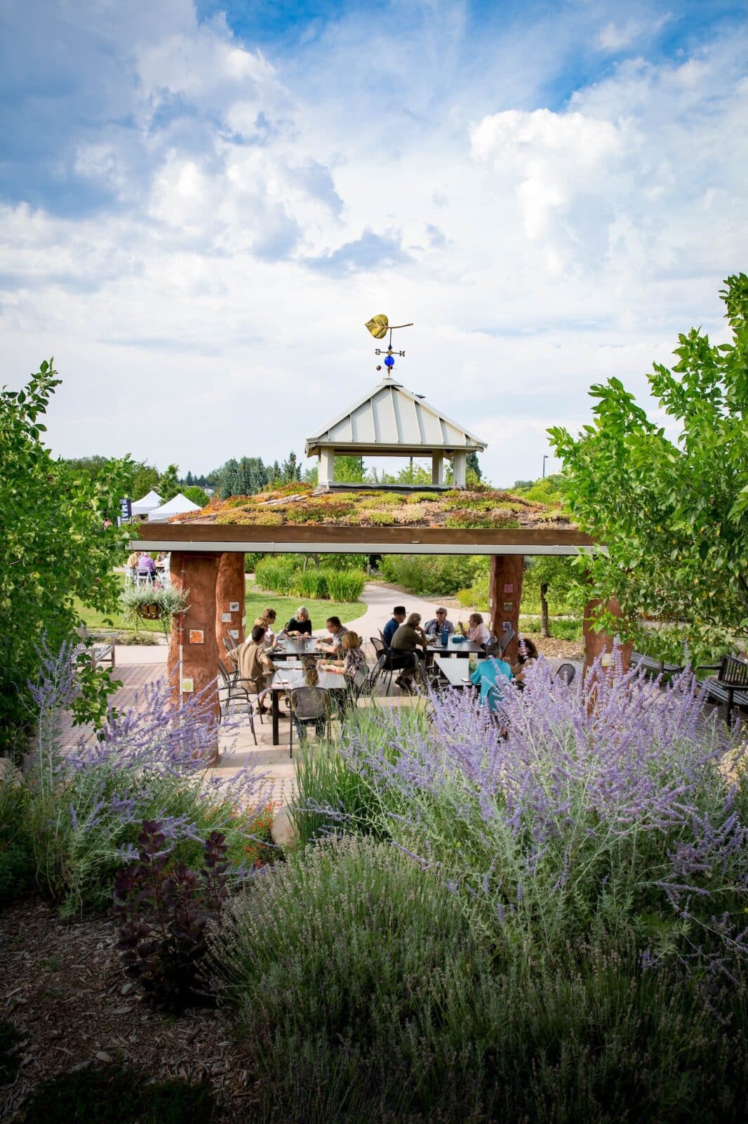 people dining under a covered gazebo at Gardens on Spring Creek