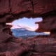 looking at Pikes Peak through a keyhole in the sandstone rocks at Garden of the Gods