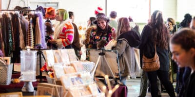 people shop vendors for It's a RiNo-Ful Life event in December 2024