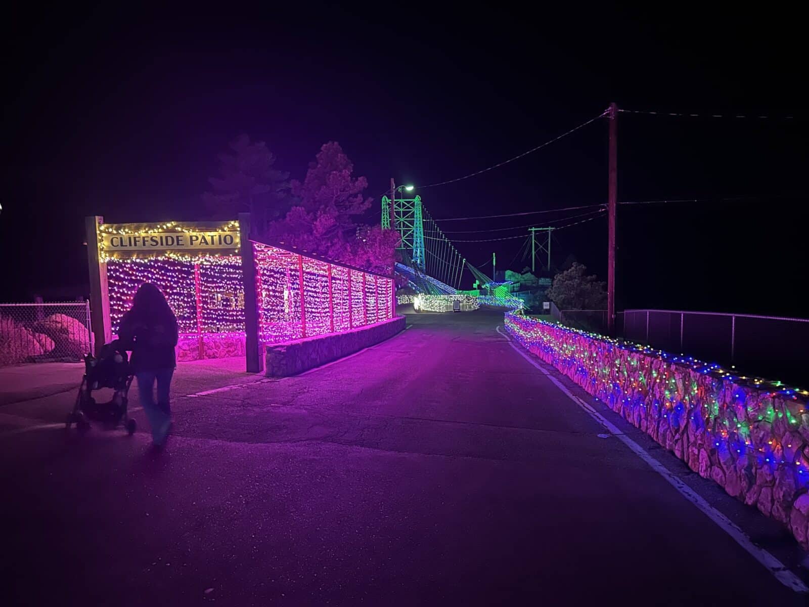 tunnel of pink lights with Royal Gorge Bridge of Lights in background