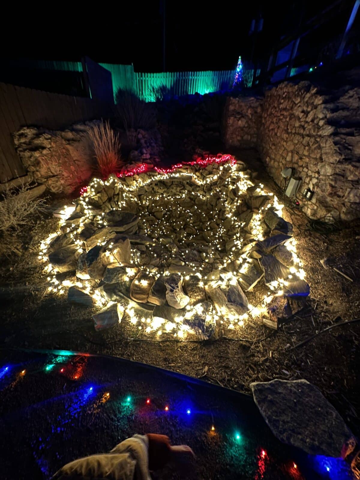 circle of lights around circle of rocks at the Bridge of Lights