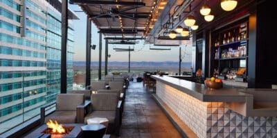 view of the rooftop bar 54thirty and the Front Range mountains