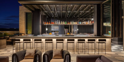 view of the rooftop bar in the evening at Halo Rooftop Bar in Kimpton Claret Hotel