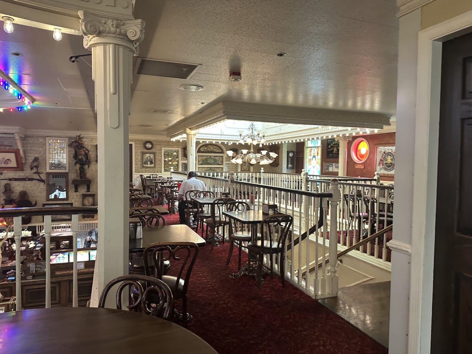 upstairs dining with railing at Fargo's Pizza Company in Colorado Springs