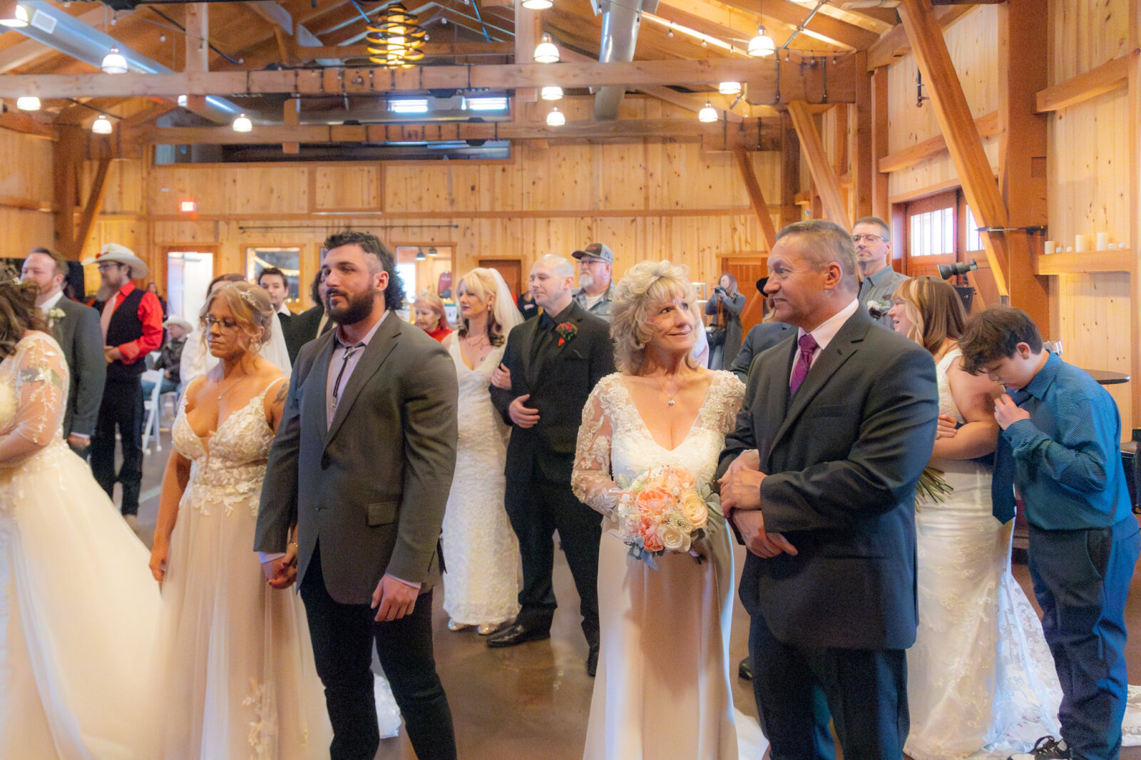 couples line up at the Loveland Valentine's Day Group Wedding