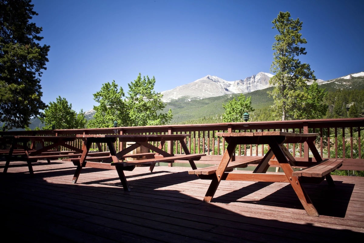 Balcony with picnic tables at Dao House in Estes Park