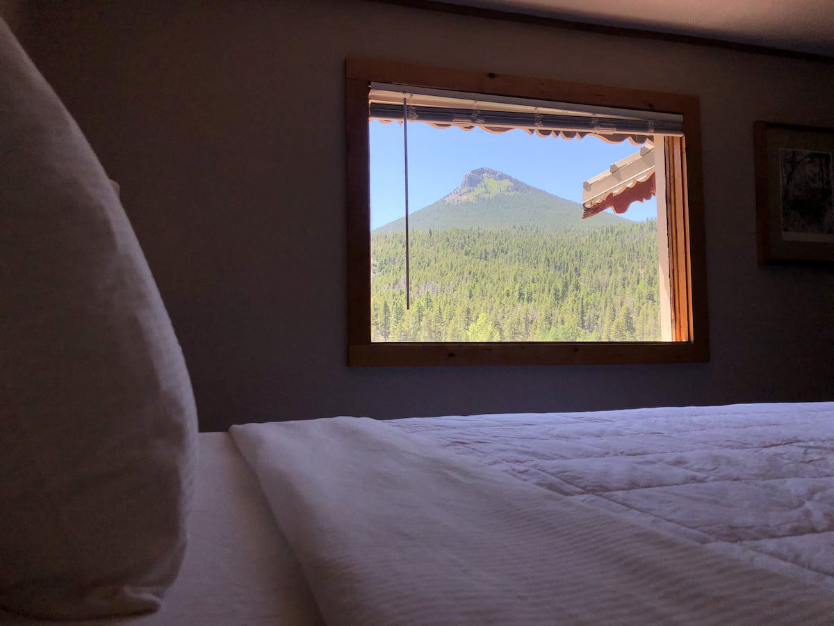 mountain view from window of Blue Spruce Comfort Queen Cabin at Dao House in Estes Park
