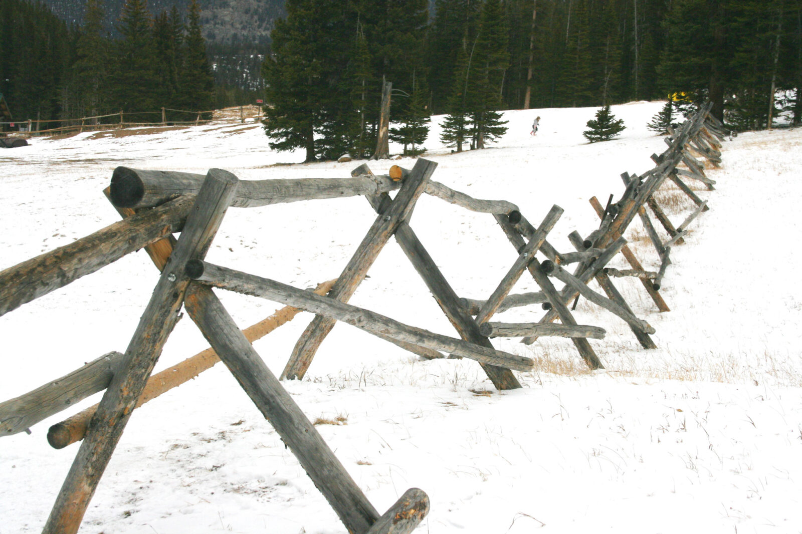 wooden fence designating the snow play area at Hidden Valley in Rocky Mountain National Park